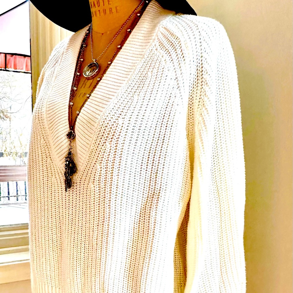 A new day deep V sweater. Beautiful cream color.